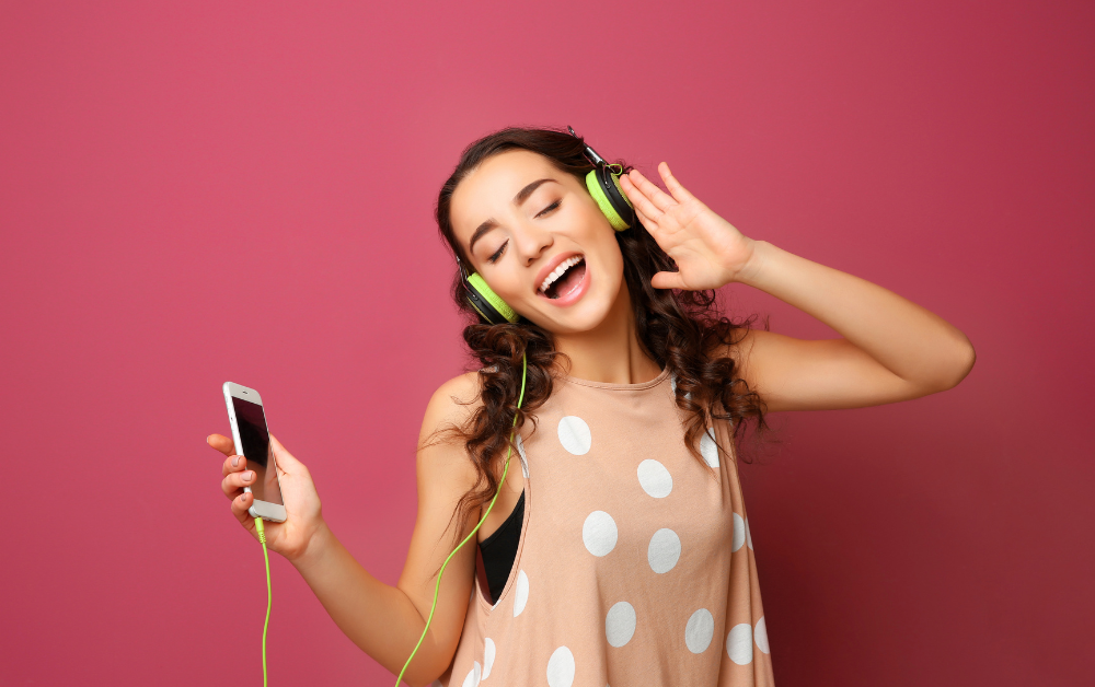 woman listening to music, mood booster