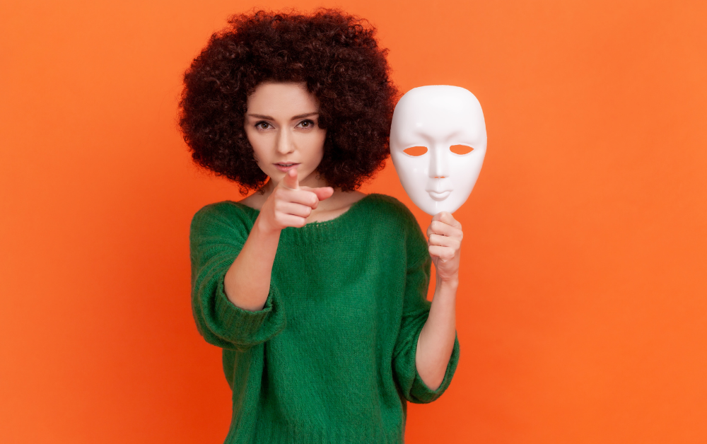 woman holding mask